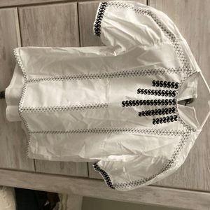 White stitched blouse